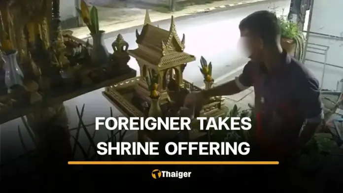 CCTV Shows Foreigner Taking Offerings from Phuket Spirit House